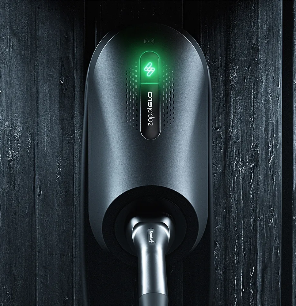 myenergi Zappi GLO EV charger mounted on timber cladding.